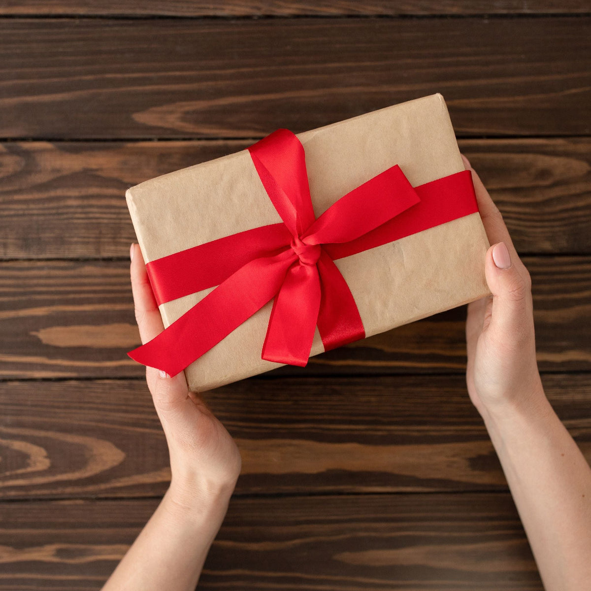 NAE Vegan Shoes Special Moment Gift Card - wrapped gift box with red ribbon