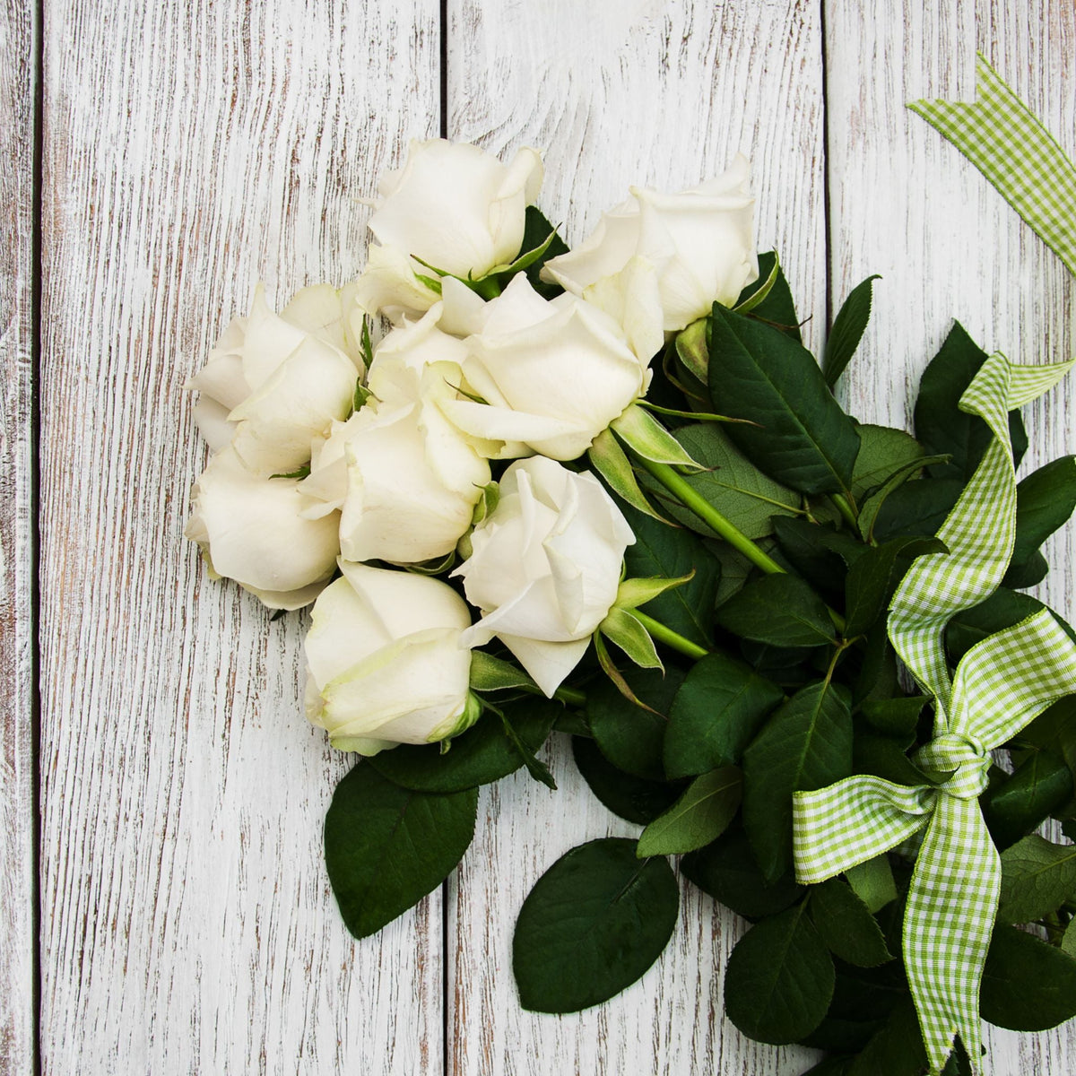 NAE Vegan Shoes Anniversary Gift Card - white roses on wood with green ribbon