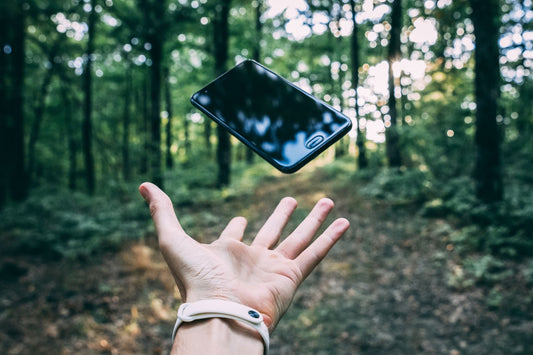 phone hand wood