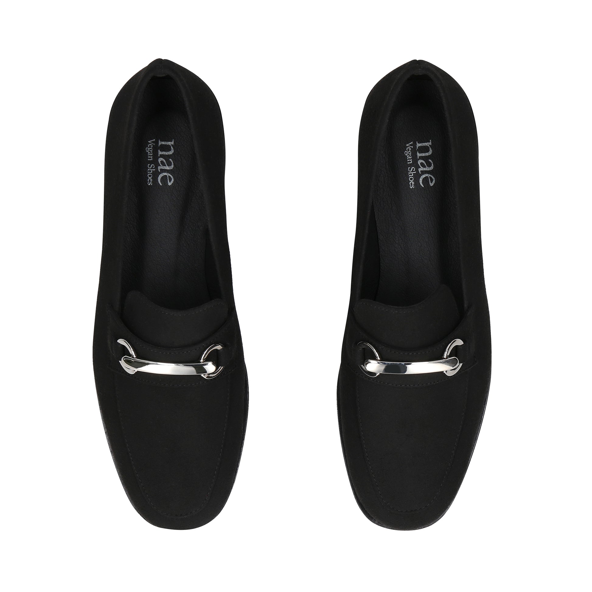 Black loafers with silver accents on a white background