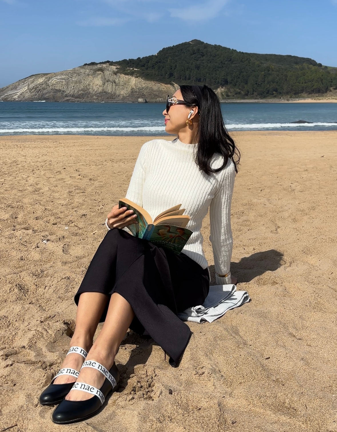 Life picture wearing dress on the beach with NAE Vegan Shoes