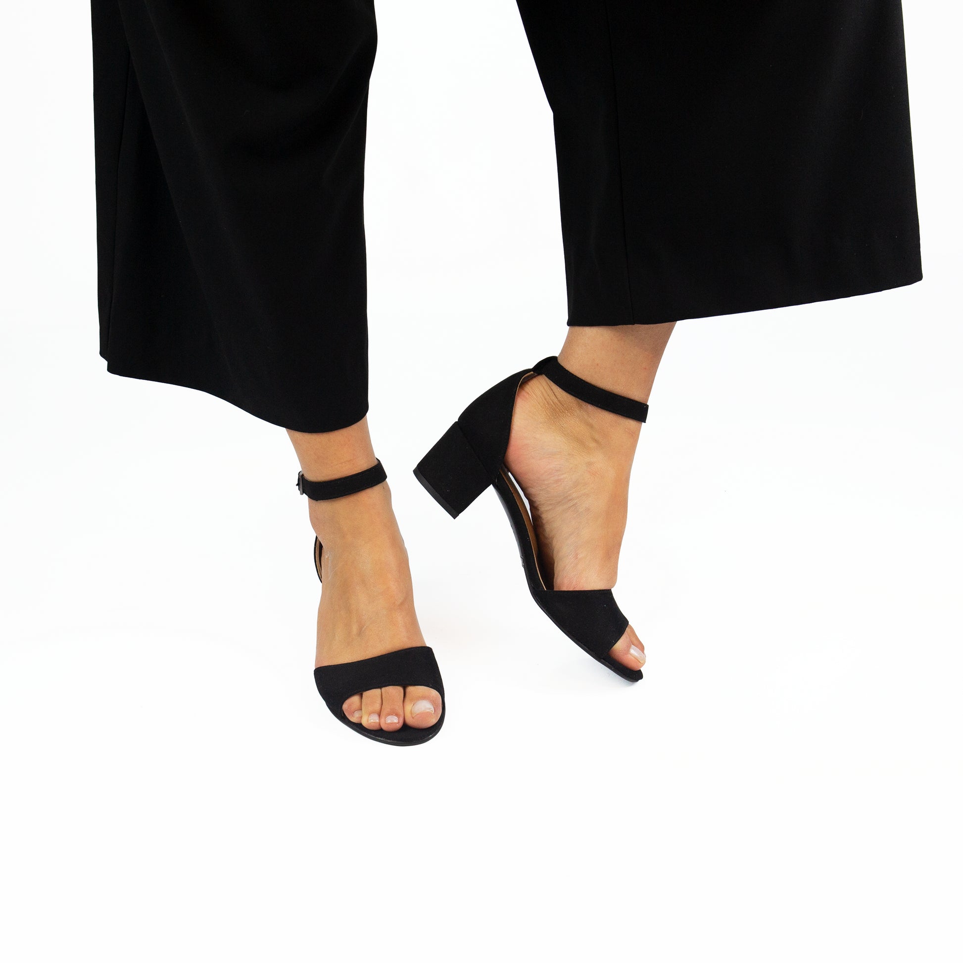 wide pants wearing vegan black sandals made with microsuede | NAE Store