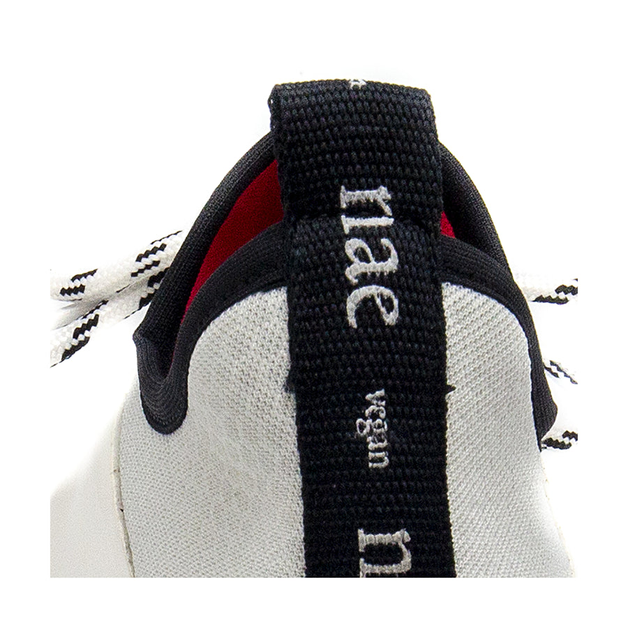 logo embroidered on the back of white women vegan sneakers | NAE Vegan Shoes Shop