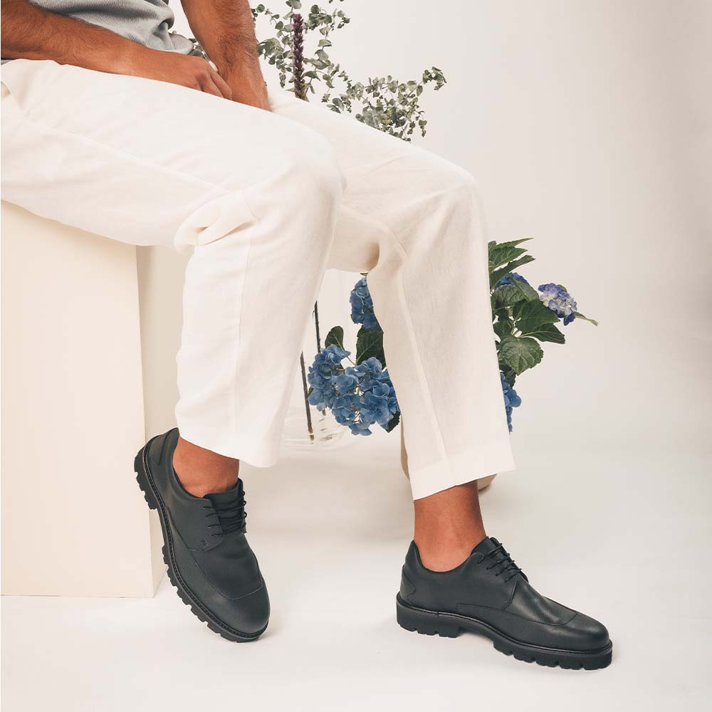 Black vegan casual derby shoes for men wearing summer white pants | NAE Footwear