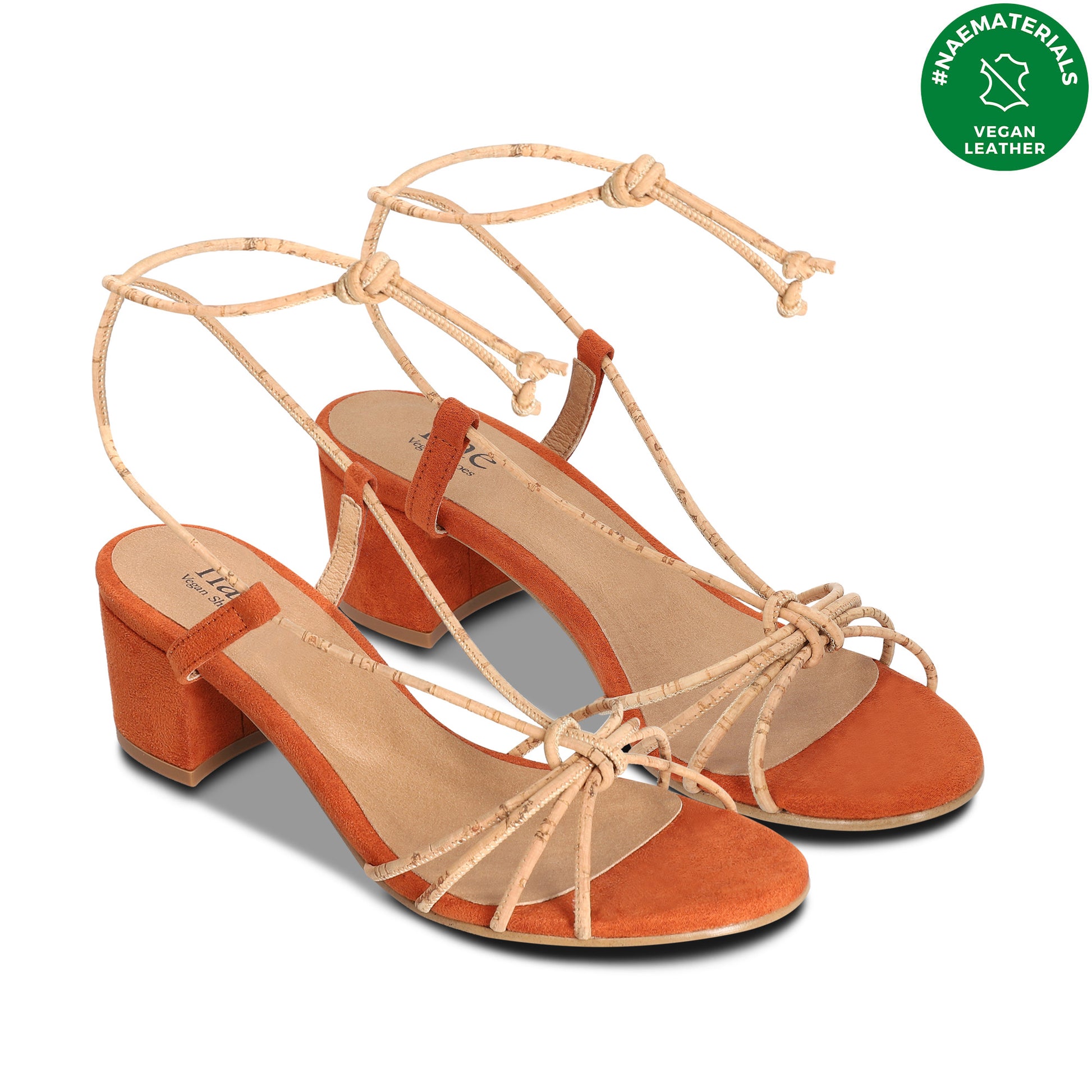 two orange sandals diagona view vegan leather label from NAE Vegan Shoes Materials