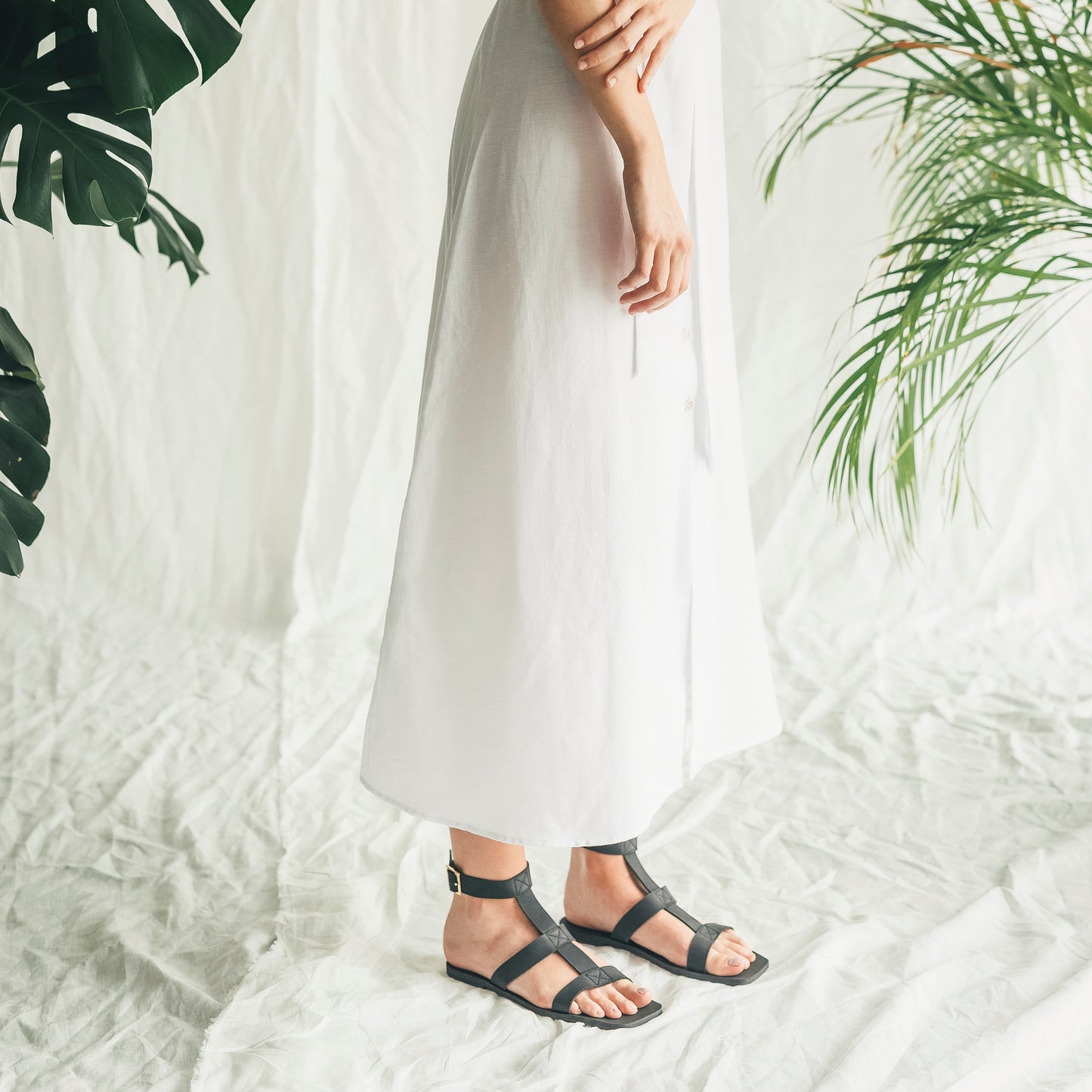 black roman sandals flats with white summer dress | NAE Store