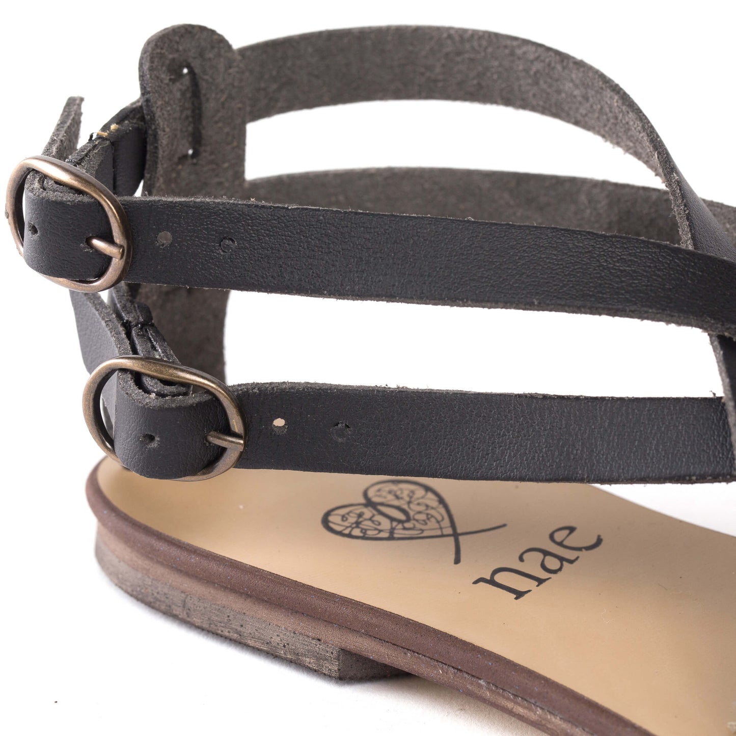 close view buckle-straps and logo on the insole of NAE Vegan Shoes sandal