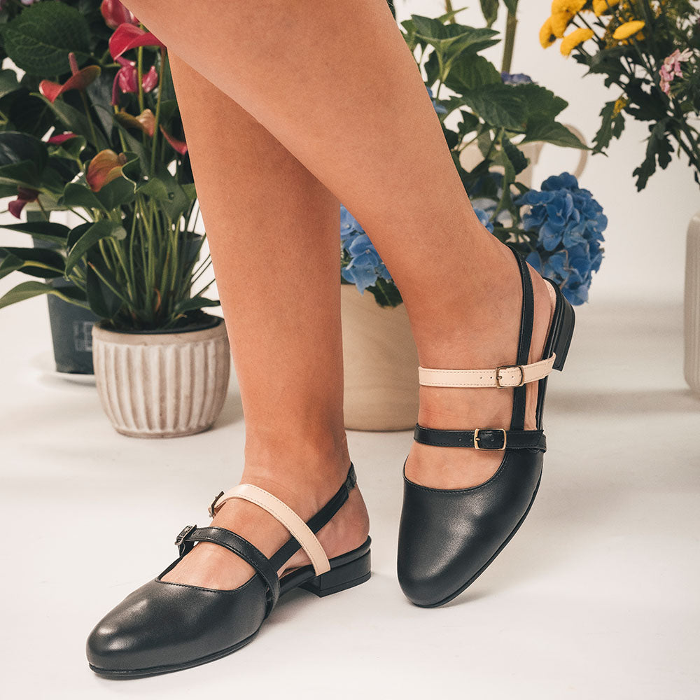 vegan flat shoes ballerina slingback with straps in black and beige within lifestyle context | NAE Footwear