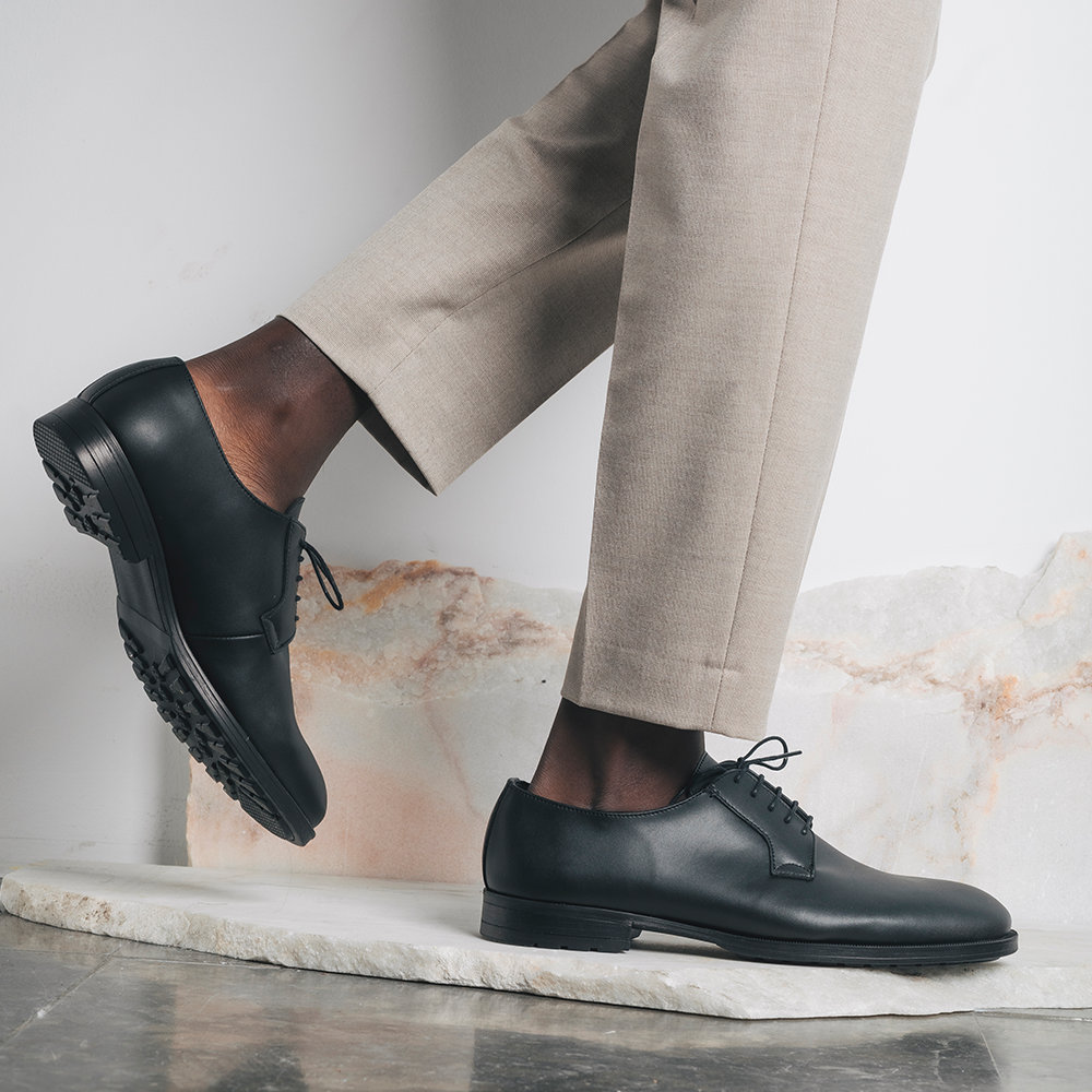 Men black blucher shoes crafted from vegan leather wearing pants | NAE Vegan Shoes