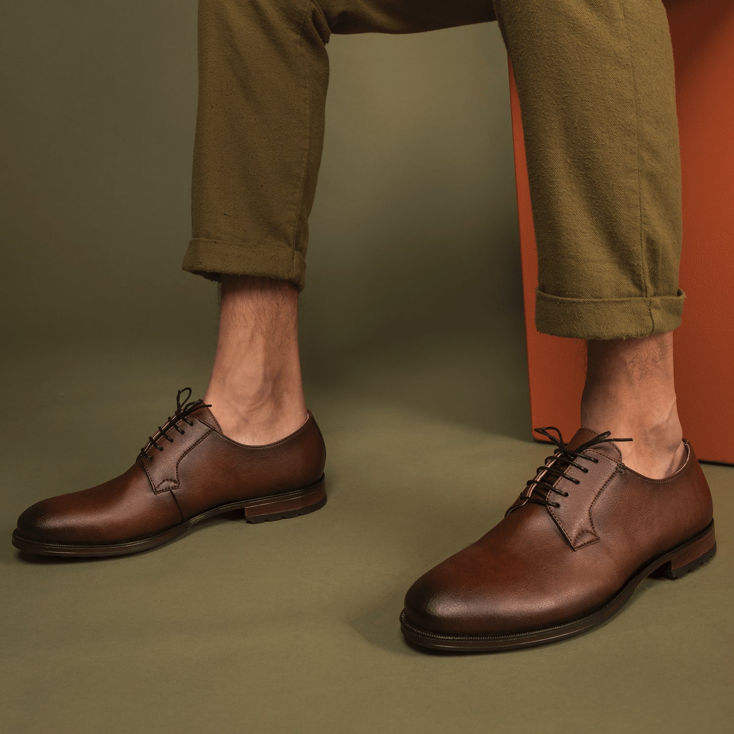 Men brown vegan shoes blucher made with sustainable microfibers wearing pants | NAE