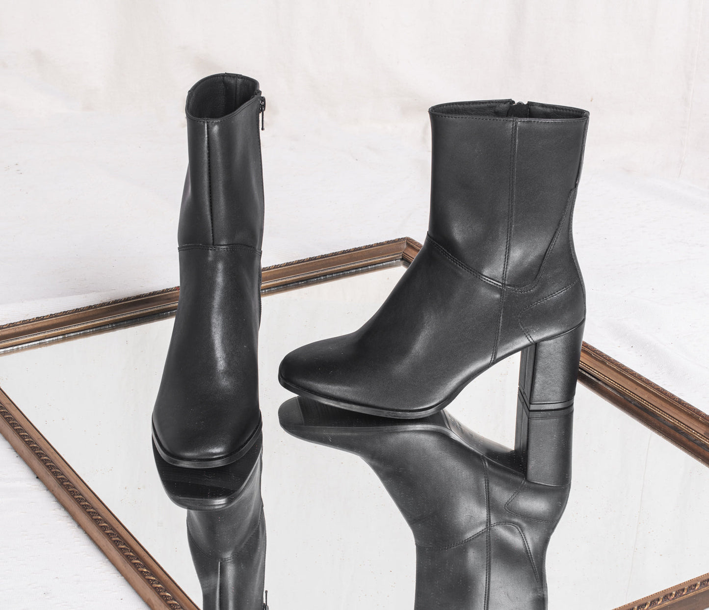 front and side view of ankle boots crafted from sustainable microfibers | NAE Store