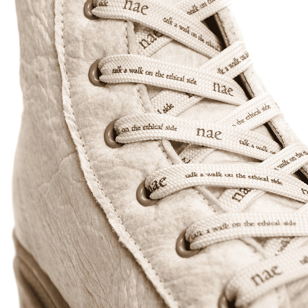 logo printed on the laces of a vegan boot crafted from Piñatex | NAE Vegan Shoes