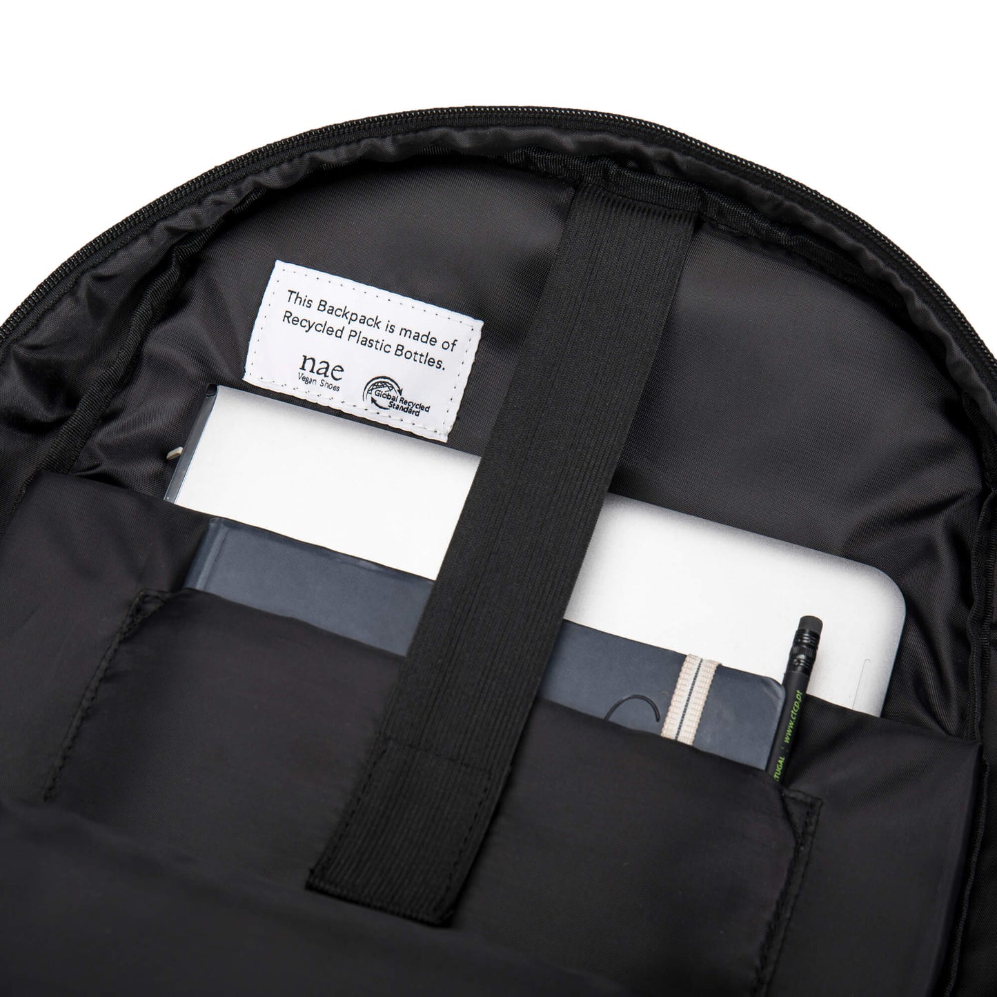 Inner pockets and compartments of the vegan backpack from NAE Store